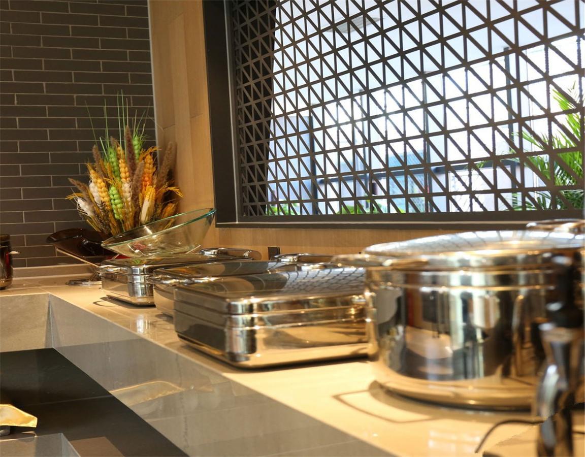 Qiu Guo Hotel Hua Mao Chaoyang  エクステリア 写真