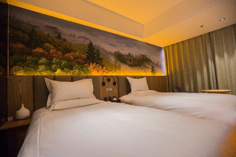 Qiu Guo Hotel Hua Mao Chaoyang  エクステリア 写真